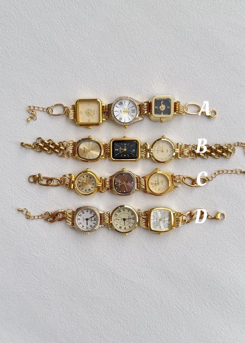 May include: Four gold-tone wristwatches with different face designs and gold-tone chain link bands. The watches are arranged in a row from top to bottom, labeled A through D.