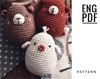 May include: Crochet amigurumi pattern for a brown bear, a red fox, and a white chick. The pattern is available in English and includes instructions for making each animal.