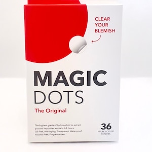 May include: A white box with red accents and the text "CLEAR YOUR BLEMISH" and "MAGIC DOTS" in black. The box contains 36 hydrocolloid patches. The text "The Original" is printed below the product name.