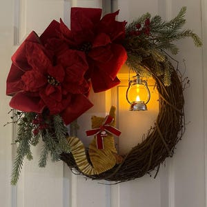 Einfangen der Laterne am Weihnachtskranz