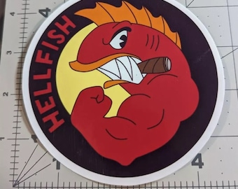 Adesivo de vinil recortado com o logotipo da Flying Hellfish, do filme "Os Simpsons", medindo 4,25 x 4,25 polegadas.