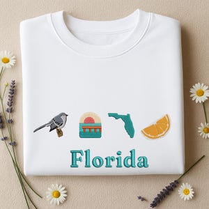 Sweat-shirt côte de Floride – Carte d'État brodée, orange, oiseau et coucher de soleil – T-shirt de vacances à la plage – Cadeau de voyage pour les amoureux de la Floride