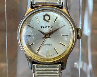 Vintage Timex Q 1970’s New Battery Runs Champagne Dial Gold Case