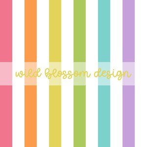 May include: A colorful background design with vertical stripes in pink, orange, yellow, green, blue, and purple. The words "wild blossom design" are written in gold cursive across the center of the image.
