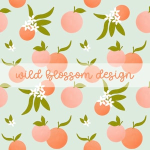May include: A repeating pattern featuring pink and orange peaches, green leaves, and white blossoms on a pale green backdrop. The image includes the text "wild blossom design" in a cursive font, creating a cohesive design.