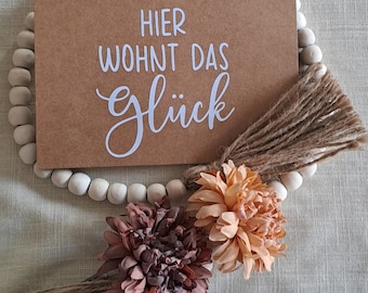 selbstgemachte, schlichte Grußkarte zum Einzug " Hier wohnt das Glück"