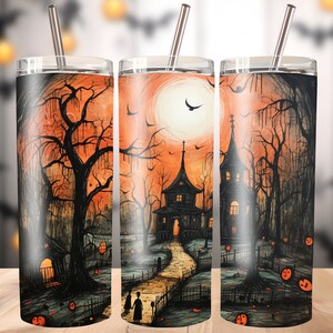 May include: A set of three stainless steel tumblers with a Halloween-themed design. The design features a spooky house, trees, and a full moon. The tumblers are perfect for holding hot or cold beverages.