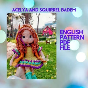 May include: A handmade crochet doll with red hair and a yellow dress. The doll has a detailed design with purple and orange accents. The image includes text that reads "ACELYA AND SQUIRREL BADEM" and "ENGLISH PATTERN PDF FILE".