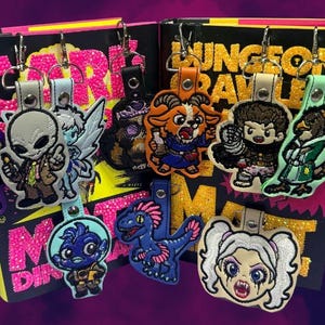 Dungeon Crawler Carl Chibi Keychains | Machine Embroidered Marine Vinyl Key Fob | Carl, Princess Donut, Mongo, Samantha & More