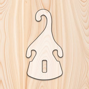 May include: A wooden clothes hanger with a distinctive shape. It features a curved hook, a broad body with two curved cutouts, and a rectangular slot at the base. The hanger is crafted from light-toned wood with a dark outline.