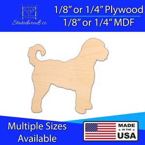 May include: A wooden dog-shaped cutout, made from light-coloured wood. The image includes text stating "1/8" or 1/4" Plywood" and "Multiple Sizes Available". The product is made in the USA. The dog is in a standing pose.