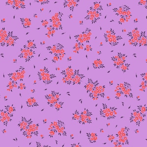 May include: A repeating pattern of small, coral-colored floral bouquets with dark purple leaves and small accents, scattered across a light purple background. The design is a seamless, all-over print, suitable for fabric or wallpaper.