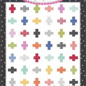 May include: A quilt pattern chart with a white background and a grid of colorful plus signs. The chart is titled "Coriander Quilts" by Corey Yoder and is labeled "#209 Positively Charming".