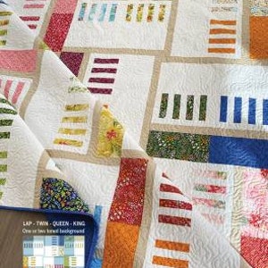 May include: A quilt pattern called "Weaverly" is a layer cake-friendly pattern for lap, twin, queen, or king size quilts. The pattern uses one or two band backgrounds. The quilt is made with colorful fabric squares and has a white background.