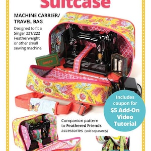 May include: A yellow floral print Stitcher's Suitcase travel bag, designed to fit a Singer 221/222 Featherweight sewing machine. The bag includes a coupon for a video tutorial. The bag is by Annie.