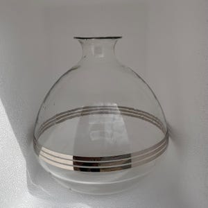 May include: A rustic wooden sign with the text "Welcome to our home" in a handwritten style. The sign features a distressed finish and a simple, inviting design, perfect for a front porch or entryway.