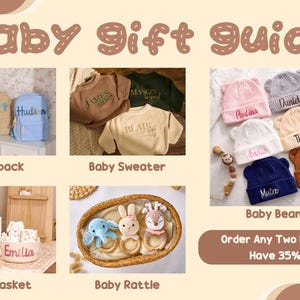 May include: A baby gift guide featuring personalized items. The image showcases backpacks, sweaters, beanies, baskets, and rattles. The items are in various colors, with names embroidered on them. The text "baby gift guide" is at the top.