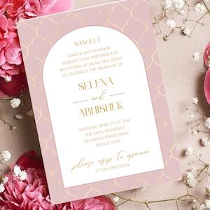 May include: A pink and gold wedding invitation with a decorative pattern. The invitation announces the Sangeet for Selena and Abhishek, taking place on Thursday, April 27 at 7pm at the Kapil Residence, 1123 Birch Pointe Drive, Toledo, Ohio. The invitation requests an RSVP to Aparna at 344-3993-2349.