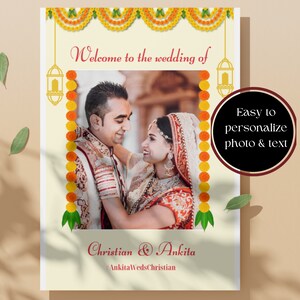 May include: A wedding invitation with a photo of a couple in traditional Indian attire. The invitation is decorated with yellow and orange flowers and lanterns. The text on the invitation reads "Welcome to the wedding of Christian & Ankita".