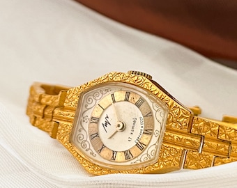 Délicate montre vintage minimaliste pour femme en or, montre mécanique pour femme, montre-bracelet de l'URSS, style Old Money, ceinturé pour fille, petite montre