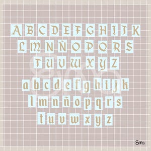 May include: A complete alphabet in uppercase and lowercase, displayed in a vintage, serif font. The letters are in a light brown color, set against a light blue background, and arranged on a grid pattern. The background is a light brown color.