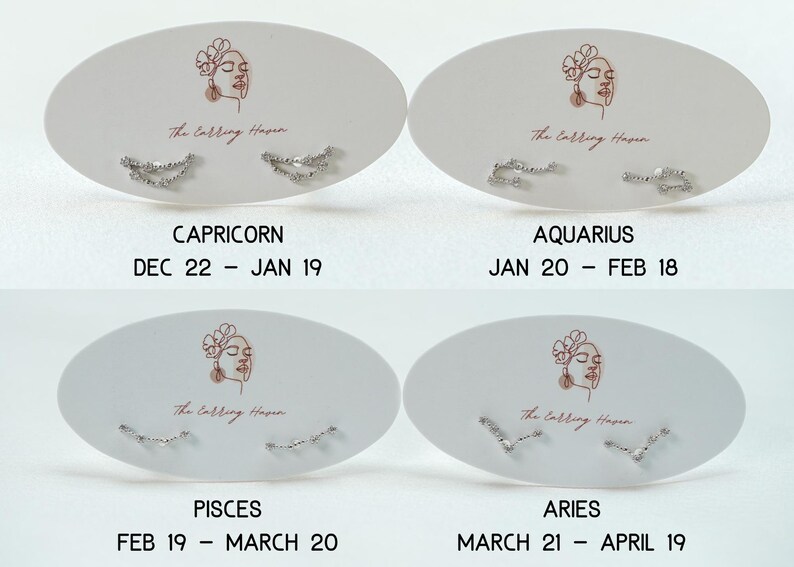 May include: Four pairs of silver stud earrings, each presented on an oval card with a zodiac sign and dates. The cards feature a line drawing of a woman's face and the text "The Calling Haven". The signs are Capricorn, Aquarius, Pisces, and Aries.
