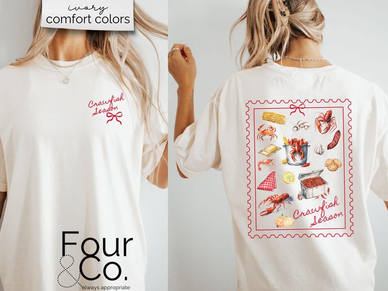 May include: A white t-shirt with the text "Crawfish Season" in red on the front and a graphic of crawfish and other food items in a red frame on the back. The shirt is from the brand "Four & Co."