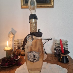 Moon Lily potion, magic potion, bottle of potion for witches, wiccans, witches, rituals, magic, curiosities