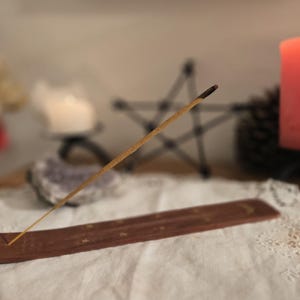 Wooden incense holder with moon and star. essential tool for witches, wicca, rituals