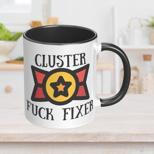 Elevate your coffee break with the "Cluster F*ck  Fixer Badge Mug"! Great gift for Coworker.