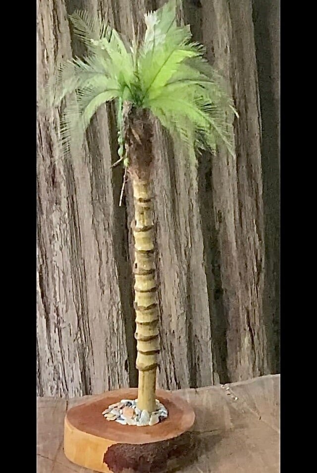 A Handmade Miniature Palm Tree Made From Natural Materials. Fronds That