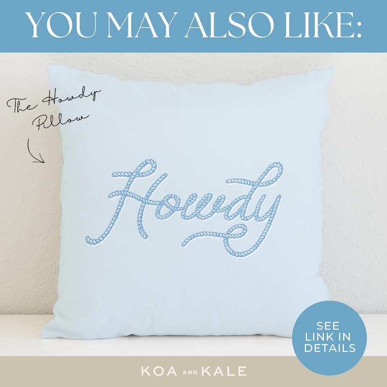May include: A light blue throw pillow with the word "Howdy" written in a rope-like font. The pillow is on a white surface with the text "The Howdy Pillow" and "KOA AND KALE" written below it.