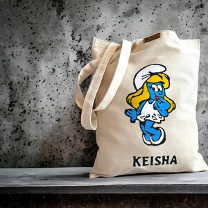 Sac Schtroumpfette peint à la main pour enfant Sac personnalisé en toile en coton Sac pour tout-petit personnalisé Cadeau de shower de bébé Chambre de bébé Sac Disney Ami des Schtroumpfs