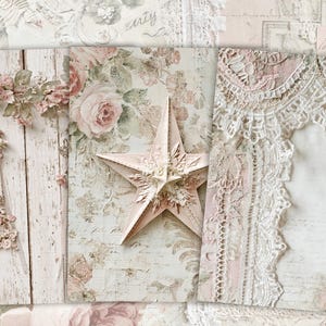 May include: A collage featuring a distressed wooden panel with floral accents, a pink star, and lace details. The color palette includes soft pinks, creams, and whites, creating a vintage, romantic aesthetic. The image evokes a shabby chic or cottagecore theme.