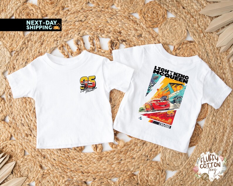 May include: Two white t-shirts with Lightning McQueen designs. One has the number "95" and "Lightning McQueen" text. The other features a colourful graphic of Lightning McQueen racing, with the text "Lightning McQueen" and "Cars".