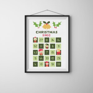 May include: A green and white Christmas bingo card with a bell and holly at the top. The card has numbers and images of people in Santa hats.