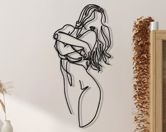 Arte de pared de metal con figura femenina, decoración minimalista lineal.