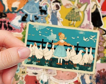May include: A rectangular sticker featuring an illustration of a blonde child in a blue dress and orange patterned top standing before a black fence, surrounded by a flock of white geese against a teal sky with white birds flying overhead.