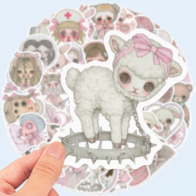 May include: A collection of stickers featuring a central sticker of a white lamb with a pink bow and a spiked collar. Surrounding stickers depict various doll-like characters in pastel colors, creating a whimsical and slightly gothic aesthetic.