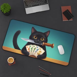 May include: A black cat illustration on a rectangular mousepad. The cat holds a knife in its mouth and playing cards with dollar signs. The background is teal and the mousepad has a wooden edge.