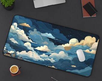 May include: A rectangular desk mat featuring a stylized painting of clouds in shades of blue, white, and yellow. A white computer mouse rests on the mat. Other items on the dark surface include a laptop, notebook, and a small potted plant.