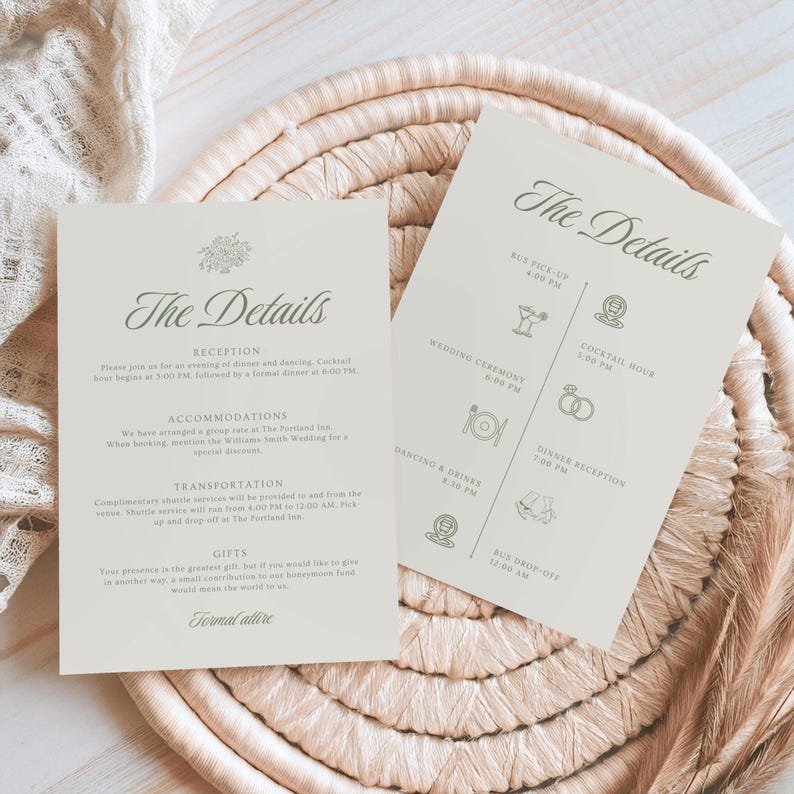 Flat lay of front and back wedding details cards styled on a woven tray with lace fabric, highlighting the event timeline with icons and clear travel and accommodation details in botanical green accents.