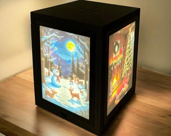AuraFrame Cube – Santa’s Christmas Eve Series | Glowing 3D Light Box with Swappable Panels