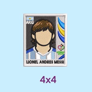May include: Embroidered patch featuring a stylized portrait of Lionel Andres Messi in an Argentina jersey. The patch includes the flag of Argentina, the text "ARG", and the text "GERMANY 2006". The patch is 4x4 inches.