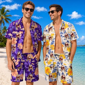 May include: Two short-sleeved button-down shirts and matching shorts sets. One set is purple with yellow hibiscus flowers and repeating face portraits, the other is white with yellow hibiscus flowers and repeating face portraits.
