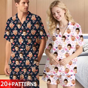 May include: Matching pajama sets with custom face and heart patterns. One set is navy blue, the other is white. The sets include a short-sleeved button-up shirt and shorts. The text "20+ PATTERNS" is visible at the bottom of the image.