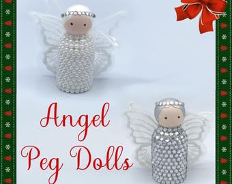 May include: Two angel peg dolls with white pearl and rhinestone bodies, silver halos, and delicate white wings. The text "Angel Peg Dolls" is written in red script. A red bow and green border with white stars and red bells complete the festive design.