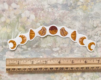 Croissant Lunar Phases Sticker: Laminated Pastry Decal for Laptop