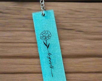 Llavero floral de resina