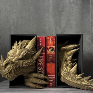 Dark Bronze Dragon Emerging from a Book Nook with two books between the head and the tail.